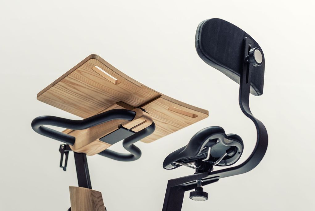 Exercise bike desk attachment outlet